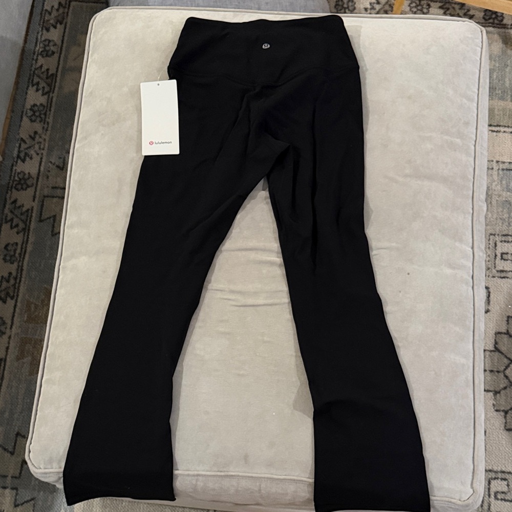 Size 6 Lululemon Black Mini-Flare Pants. Brand new. With tag